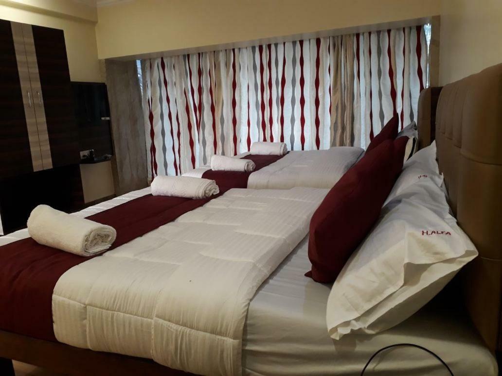 Hotel Alfa International Near Nanavati Hospital Mumbai Near Airport Mumbai Near Juhu Beach Exteriör bild